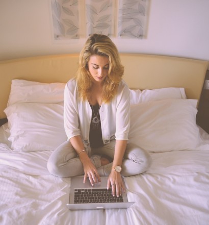 person-woman-hotel-laptop